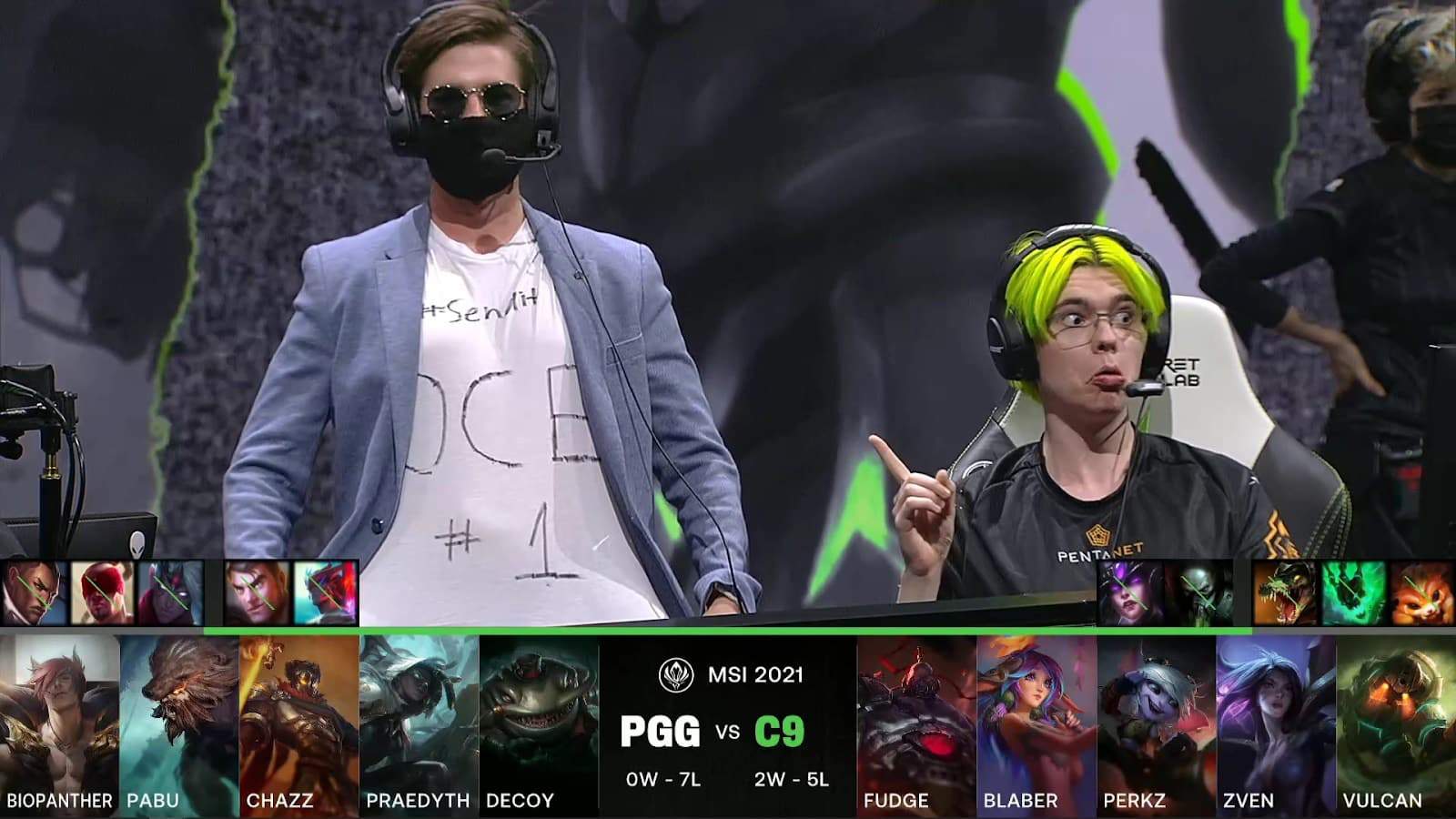 A screenshot from the LoL Esports broadcast for the Mid-Season Invitational (MSI) match between Pentanet.GG and Cloud9. The picked and banned champion drafts appear at the bottom of the image with a shot of the PGG coach wearing a OCE #1 shirt and a player pointing to it above.