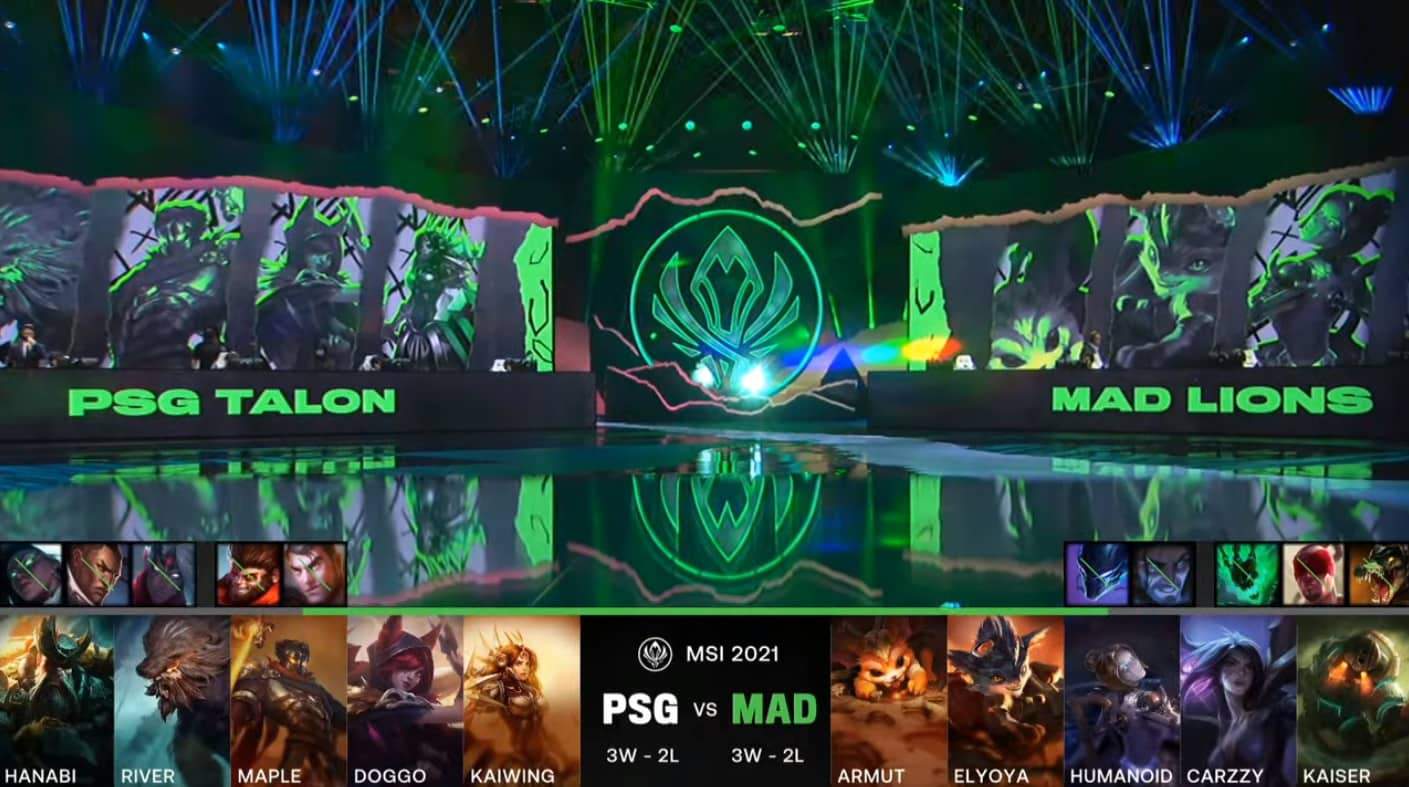 A screenshot from the LoL Esports broadcast for the Mid-Season Invitational (MSI) match between PSG.Talon and MAD Lions. The picked and banned champion drafts appear at the bottom of the image with a shot of the 2021 MSI Stage above.