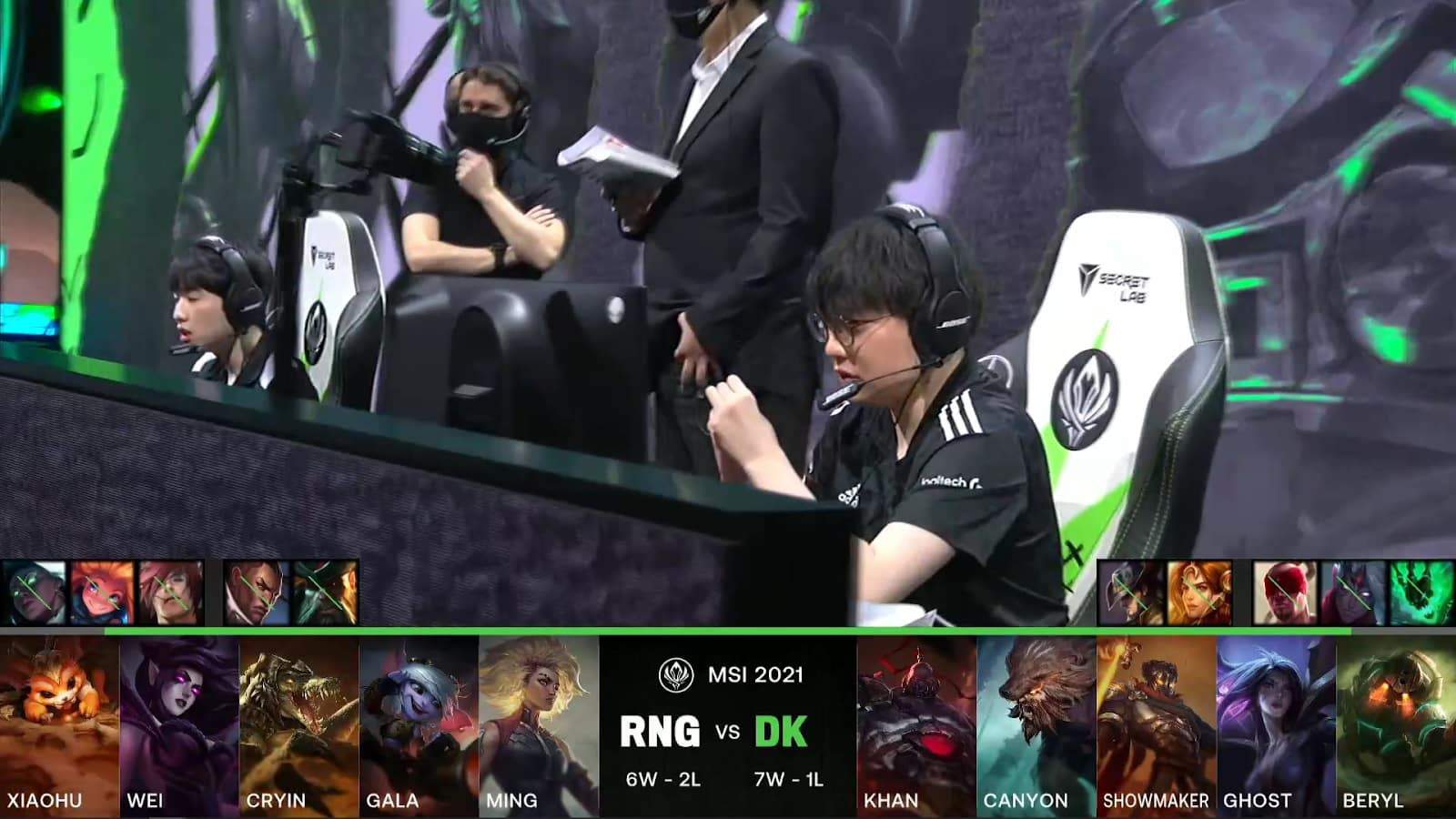 A screenshot from the LoL Esports broadcast for the Mid-Season Invitational (MSI) match between DAMWON KIA and Royal Never Give Up (RNG). The picked and banned champion drafts appear at the bottom of the image with a shot of players on the 2021 MSI stage above.