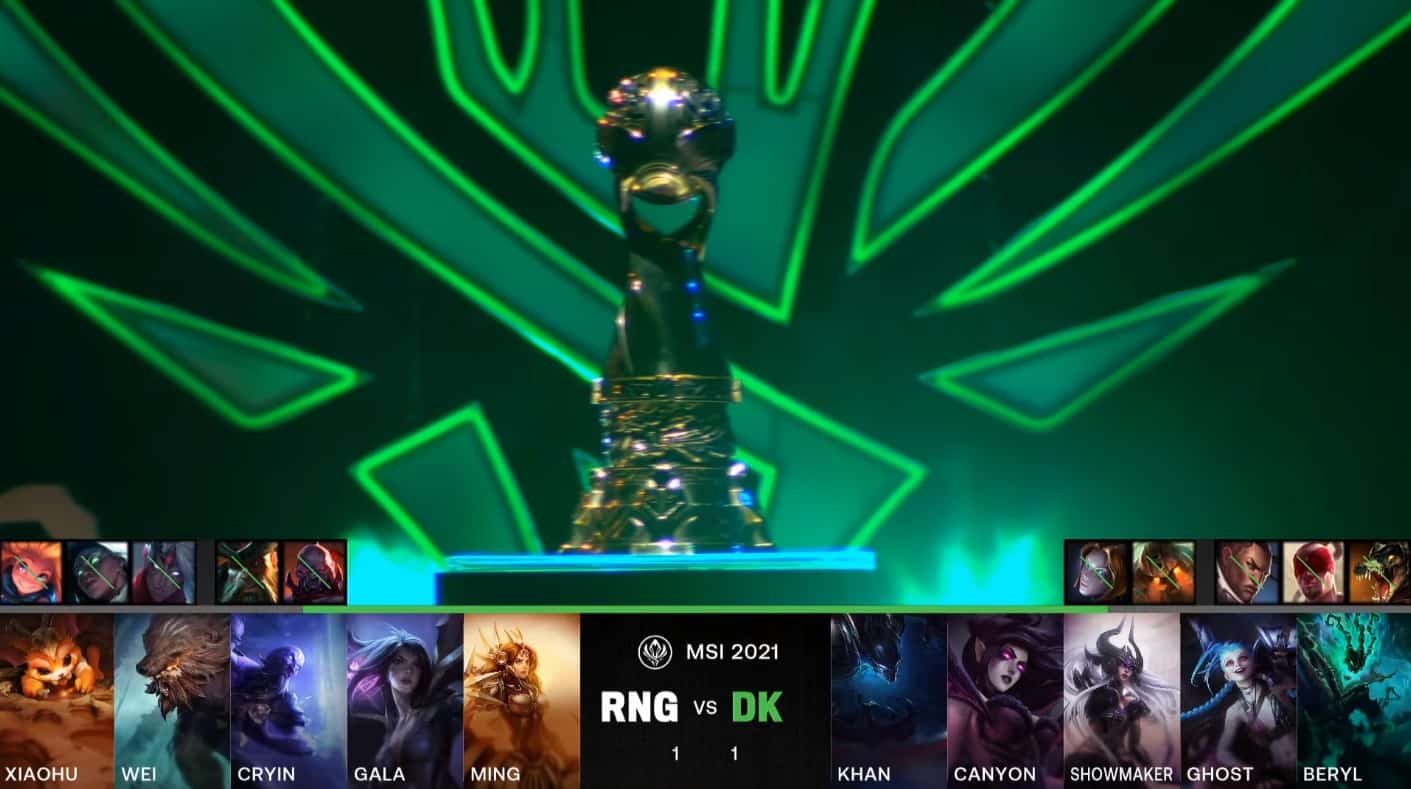 A screenshot from the LoL Esports broadcast for the Mid-Season Invitational (MSI) Grand Finals match between Royal Never Give Up (RNG) and DAMWON KIA for Game Three. The picked and banned champion drafts appear at the bottom of the image with a shot of the MSI trophy above.