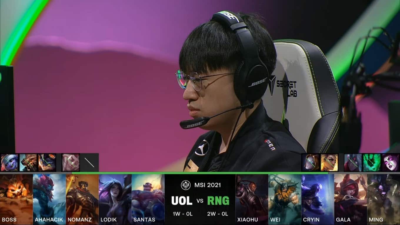 A screenshot from the LoL Esports broadcast for the Mid-Season Invitational (MSI) match between Unicorns of Love and Royal Never Give Up (RNG). The picked and banned champion drafts appear at the bottom of the image with a shot of RNG Xiaohu above.
