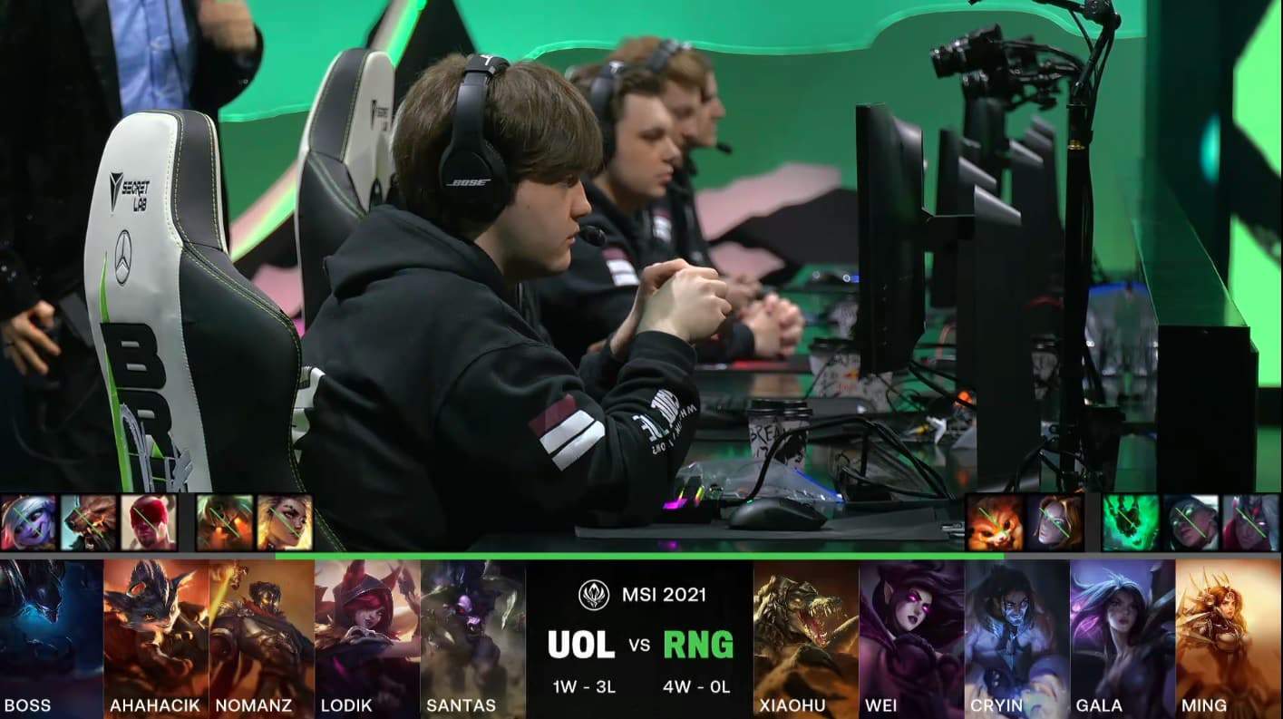 A screenshot from the LoL Esports broadcast for the Mid-Season Invitational (MSI) match between Royal Never Give Up (RNG) and Unicorns of Love. The picked and banned champion drafts appear at the bottom of the image with a shot of the UOL LoL roster above.
