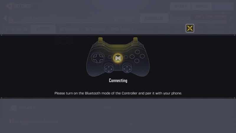 The controller connection screen, showing a generic handheld video game controller on a black screen with the word "connecting" and the instructions "Please turn on the Bluetooth mode of the Controller and pair it with your phone." written beneath