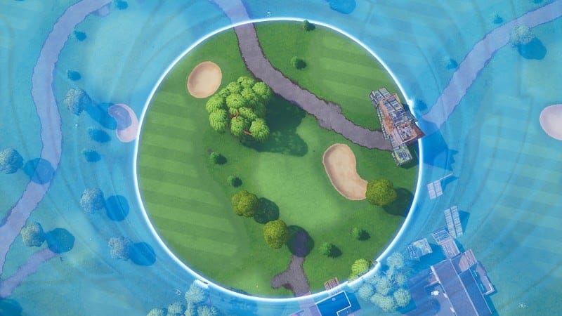 A top down view of a storm circle enclosing a small area on the Fortnite map.