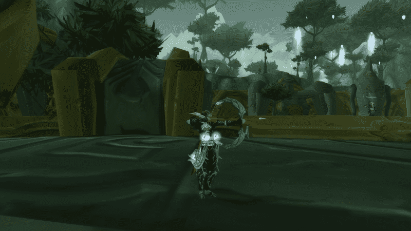 An in-game screen of a Night Elf Hunter with their bow aimed at the ready