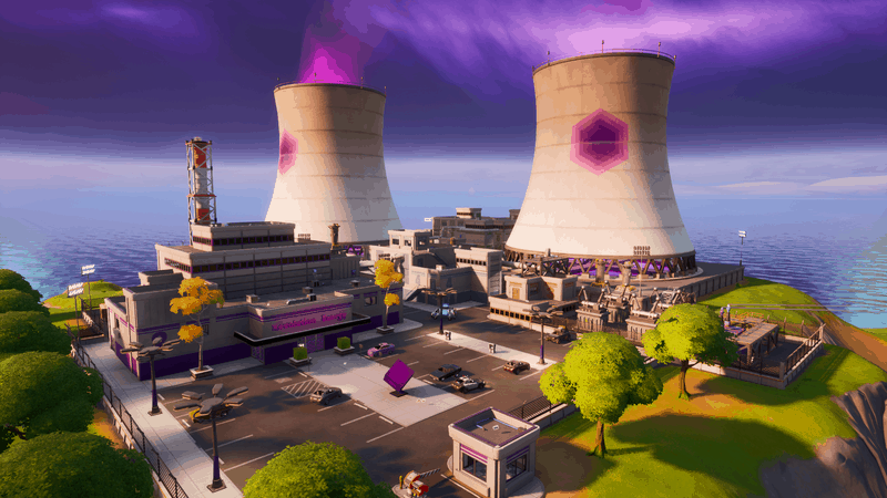 The Steamy Stacks location in Fortnite, an industrial factory with two smoke stacks emitting purple gases.