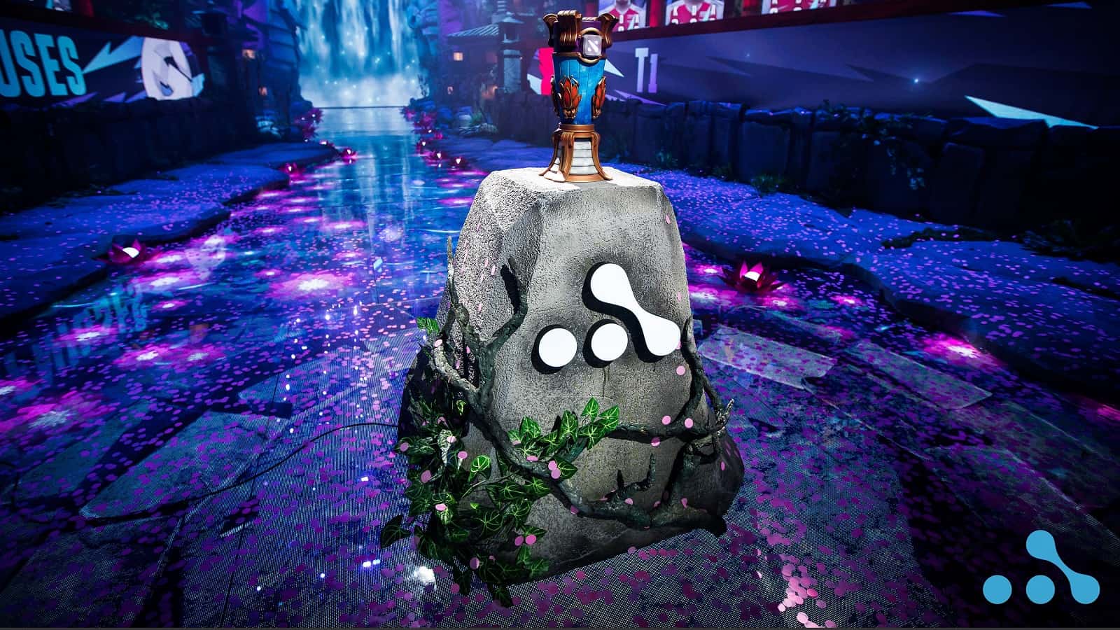 The AniMajor trophy sits atop an ancient stone pedestal with vines and flowers growing around it as part of the set for the WePlay AniMajor in Kyiv
