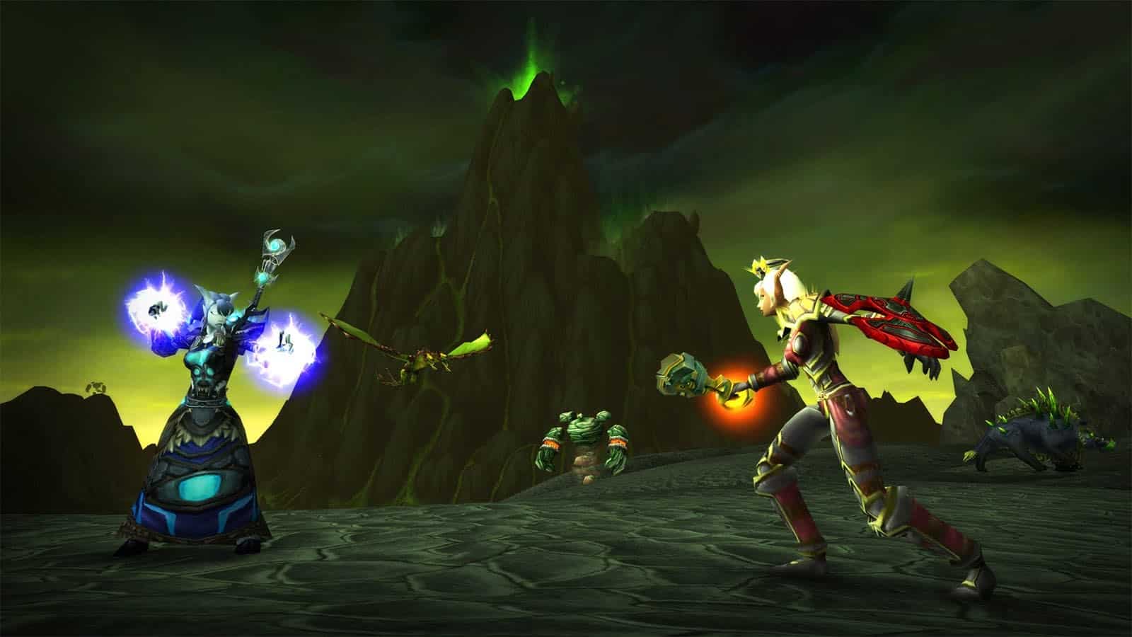 A Blood Elf Paladin and a Dranei Mage battle one another in the blasted lands