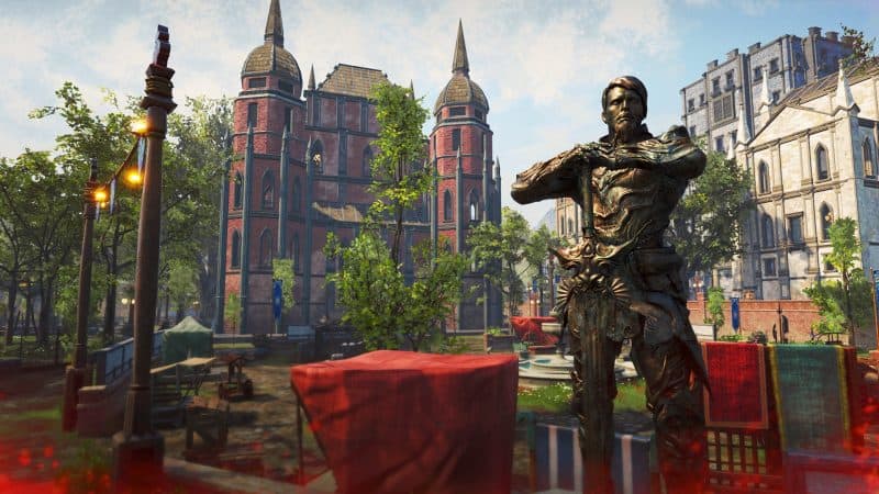A shot in Ashes of Creation showing a statue of a warrior with sword in hand amidst grand medieval buildings.