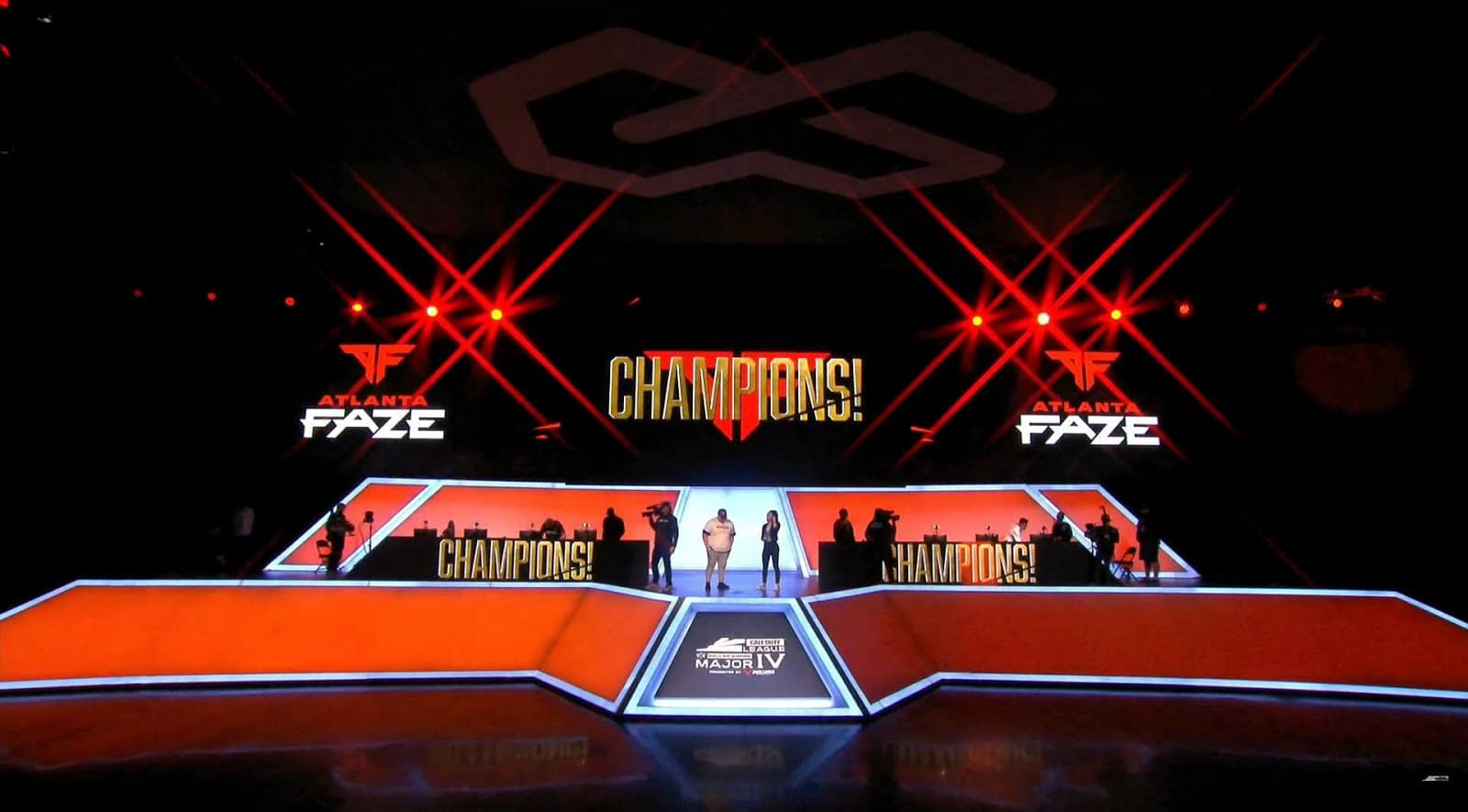 The stage lit up with the Atlanta FaZe colors and the word "Champions" displayed on the big screen after the team's recent victory