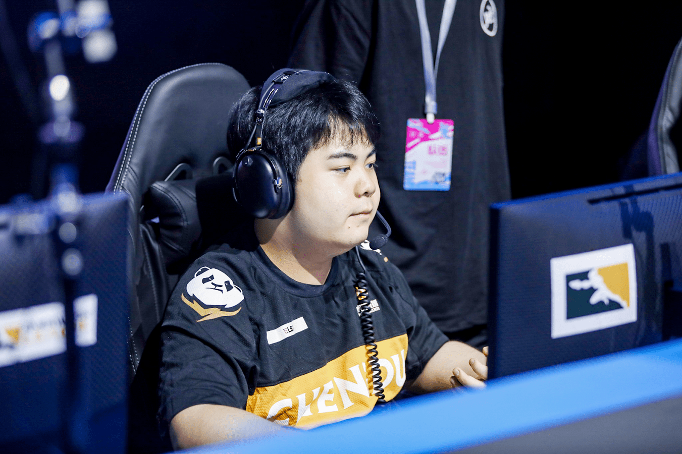 Luo "Elsa" Wenjie sits with his headset on during a live game of Overwatch League