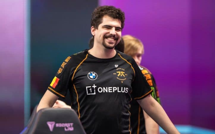 Fnatic LoL player Gabriel "Bwipo" Rau smiles and holds his arms out to his sides at the 2020 World Championship.
