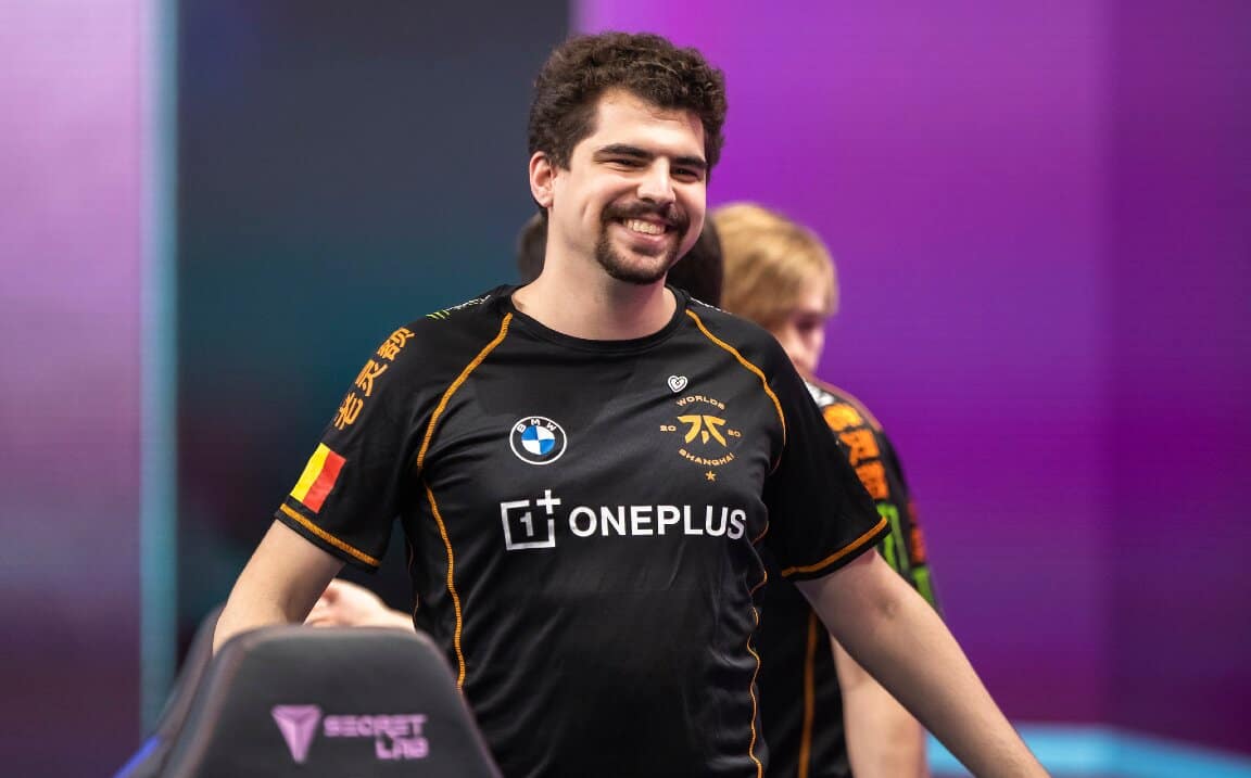 Fnatic LoL player Gabriel "Bwipo" Rau smiles and holds his arms out to his sides at the 2020 World Championship.