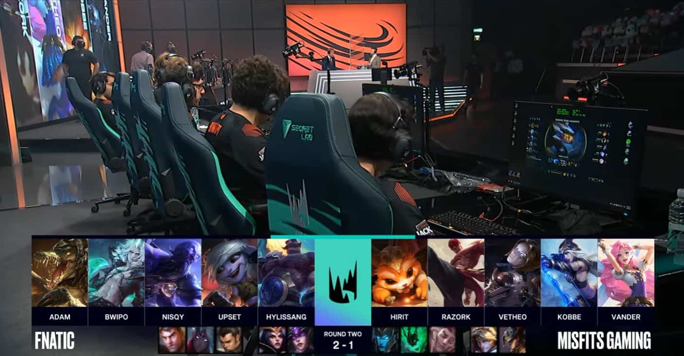 A screenshot from the LEC broadcast for the Summer Playoffs match between Fnatic and Misfits. The Game Four drafts appear on screen with a shot of the Fnatic and Misfits LoL teams on the LEC stage above.