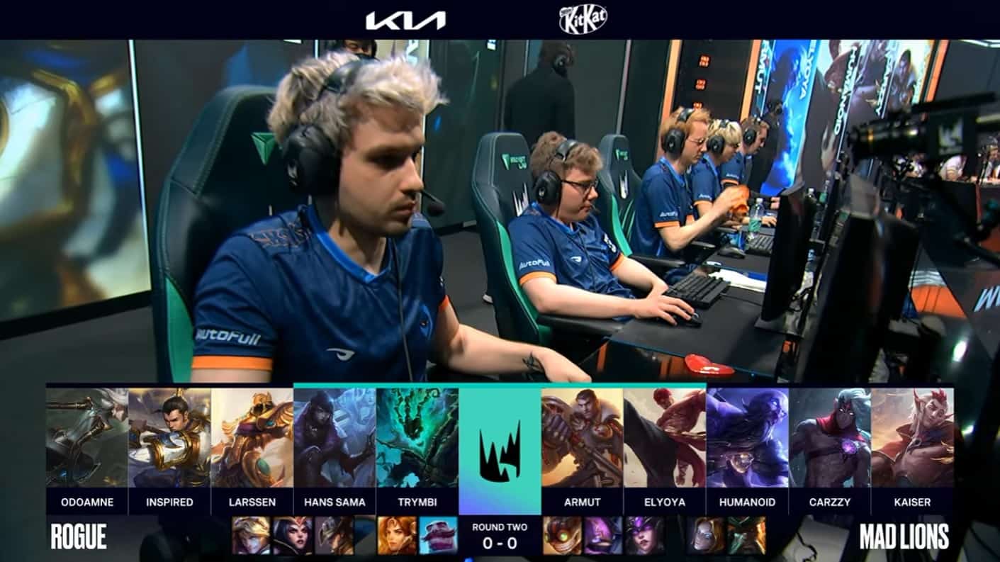 A screenshot from the LEC broadcast for the Summer Playoffs match between Rogue and MAD Lions. The Game One drafts appear on screen with a shot of the Rogue LoL team on the LEC stage above.