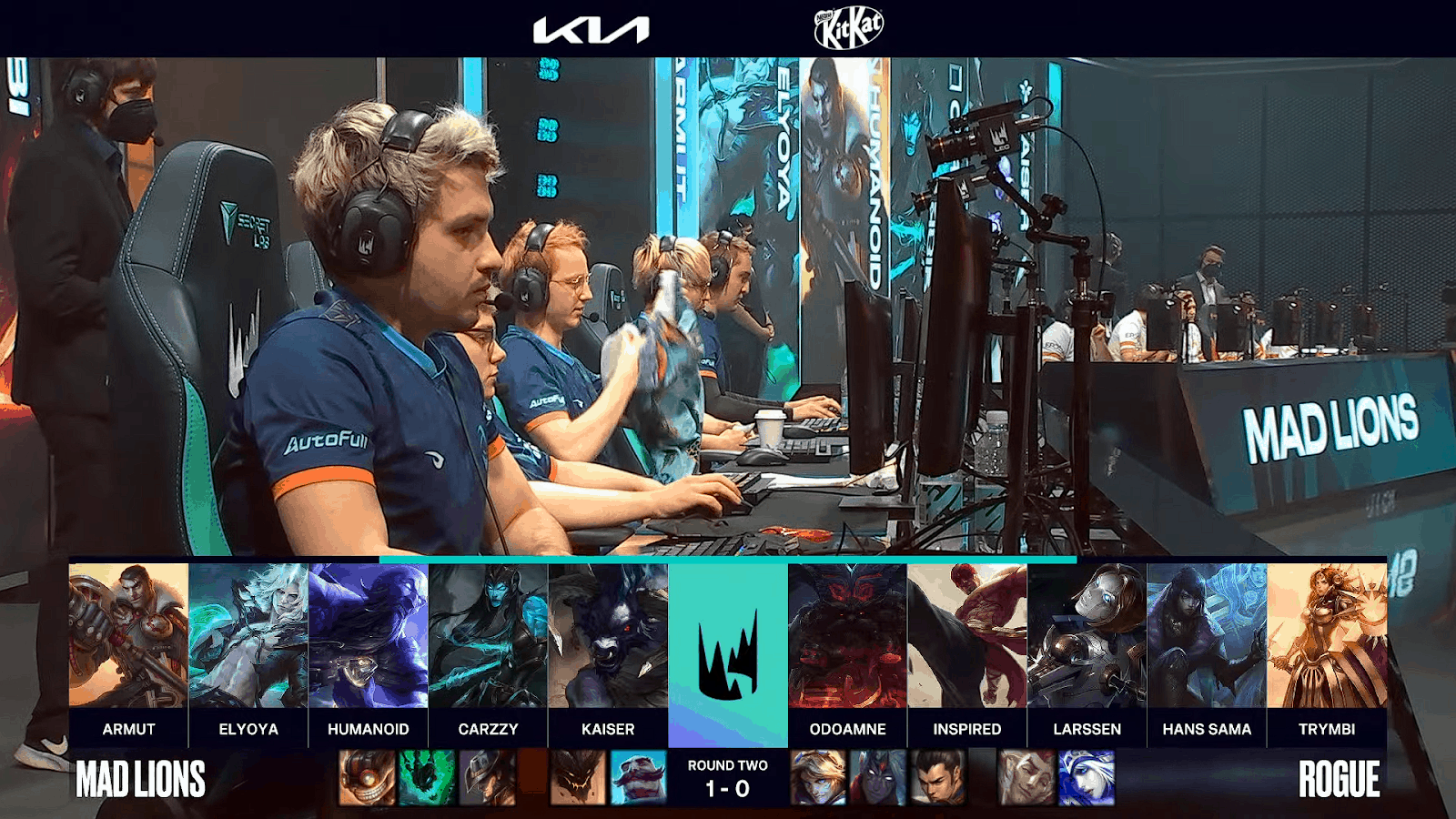 A screenshot from the LEC broadcast for the Summer Playoffs match between Rogue and MAD Lions. The Game Two drafts appear on screen with a shot of the Rogue LoL team on the LEC stage above.