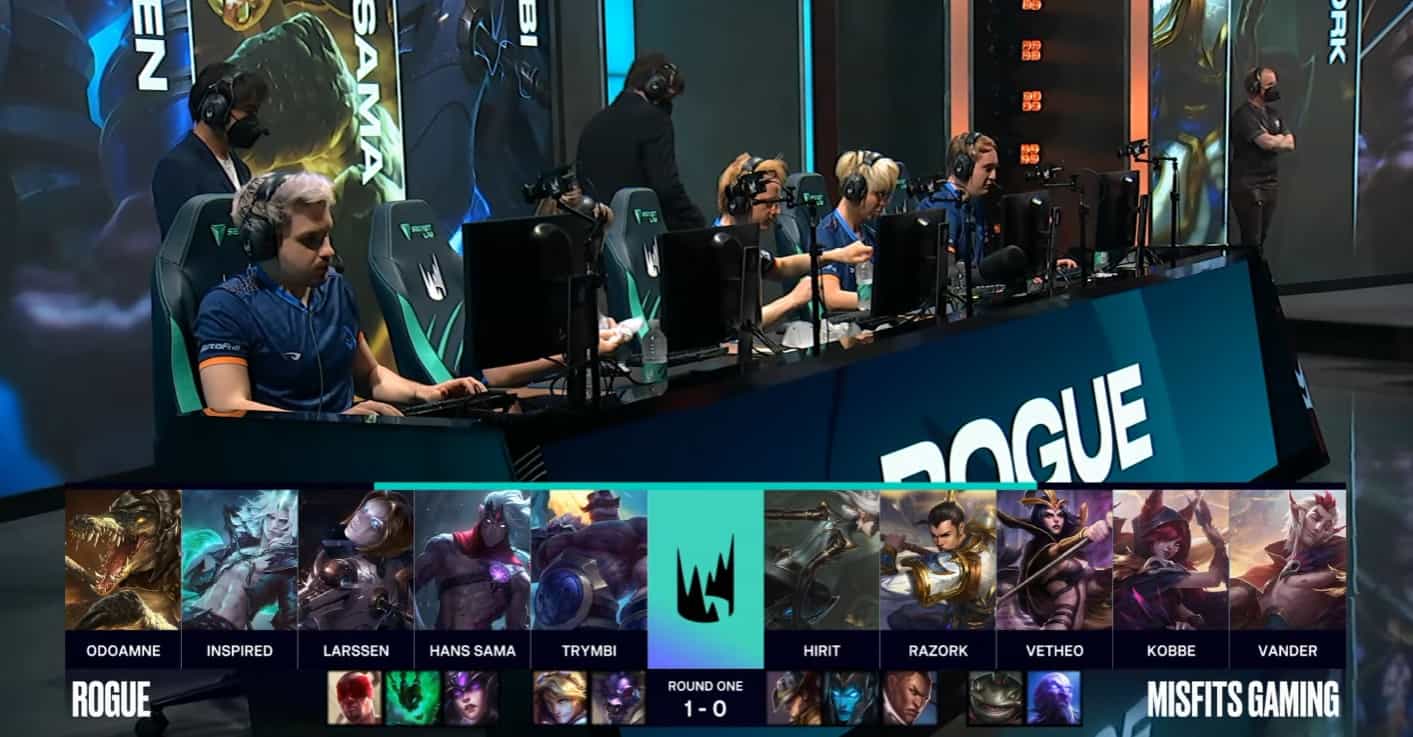 A screenshot from the LEC broadcast for the Summer Playoffs match between Rogue and Misfits. The Game Two drafts appear on screen with a shot of the Rogue LoL team on stage above.