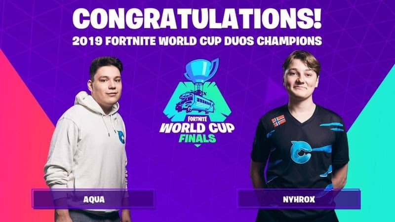 David “aqua” Wang and Emil “nyhrox” Bergquist Pedersen stand either side of the Fortnite World Cup trophy logo. The words "Congratulations! 2019 Fortnite World Cup Duos Champions" in bold white letters