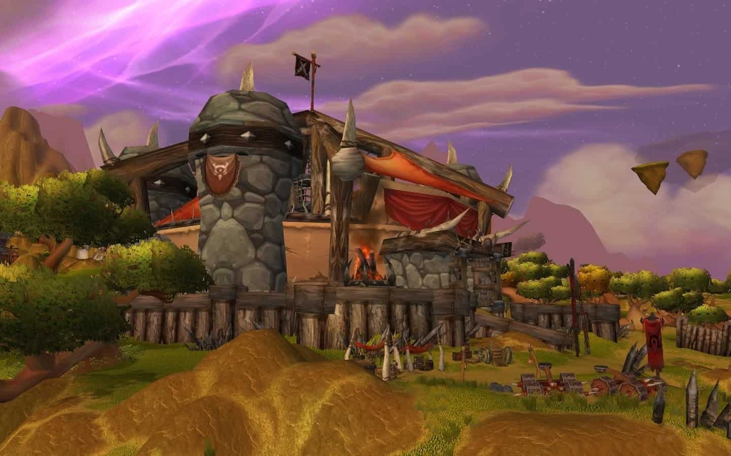 The Arena from WoW TBC Classic, a rough stone and wood structure with red banners.
