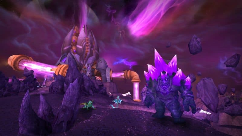 A purple crystal golem stands in front of a rocky landscape with a sinister looking facility in WoW TBC Classic.