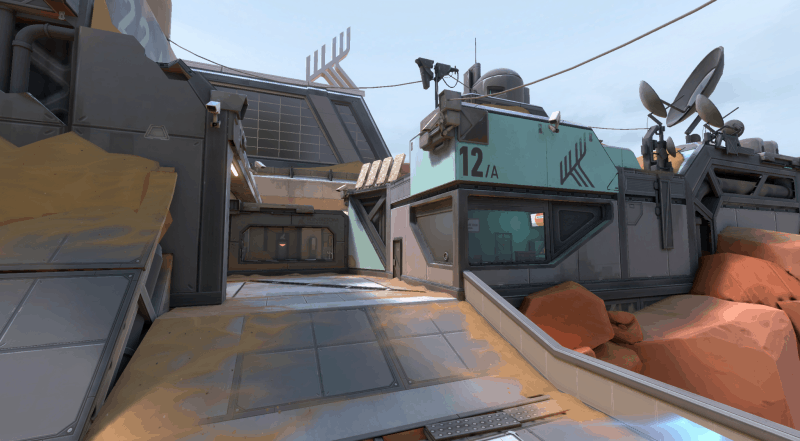 A screenshot of the new Fracture map in Valorant, showing a piece of the desert biome half of the futuristic facility.