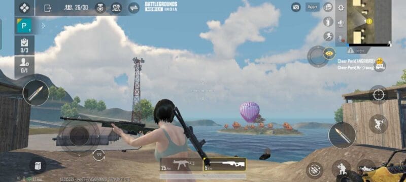 A female character from Battlegrounds Mobile India walks near a shed under a blue sky holding a bolt action sniper rifle.