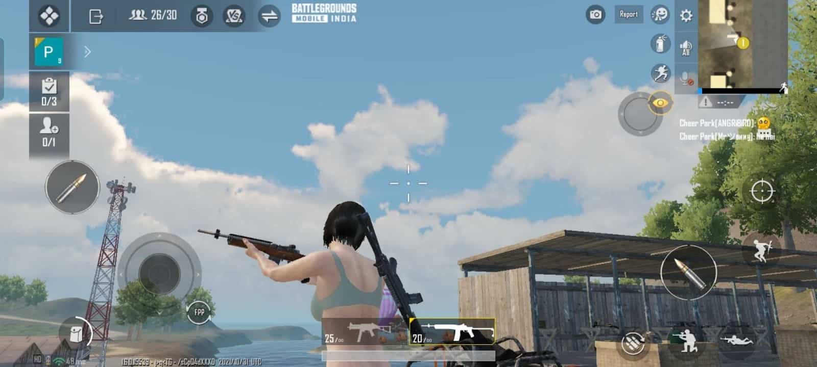 A female character from Battlegrounds Mobile India walks near a shed under a blue sky holding an automatic sniper rifle.