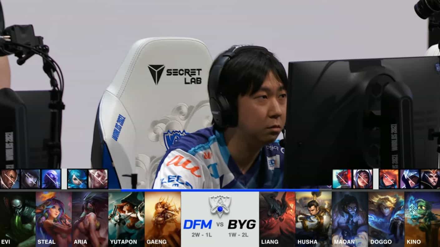 A screenshot from the 2021 World Championship Play-ins broadcast, showing the drafts between DetonatioN FocusMe and Beyond Gaming with a shot of DFM Yutapon in the middle.