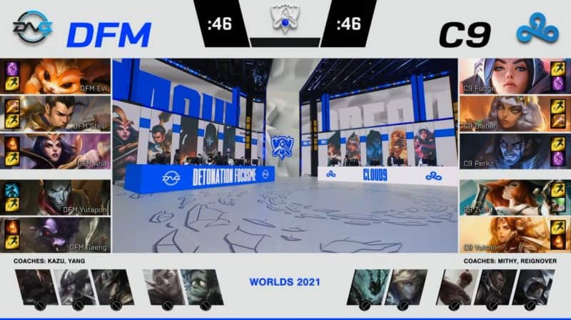 A screenshot from the 2021 World Championship Play-ins broadcast, showing the drafts between DetonatioN FocusMe and Cloud9 with a shot of the Worlds 2021 stage in the middle.
