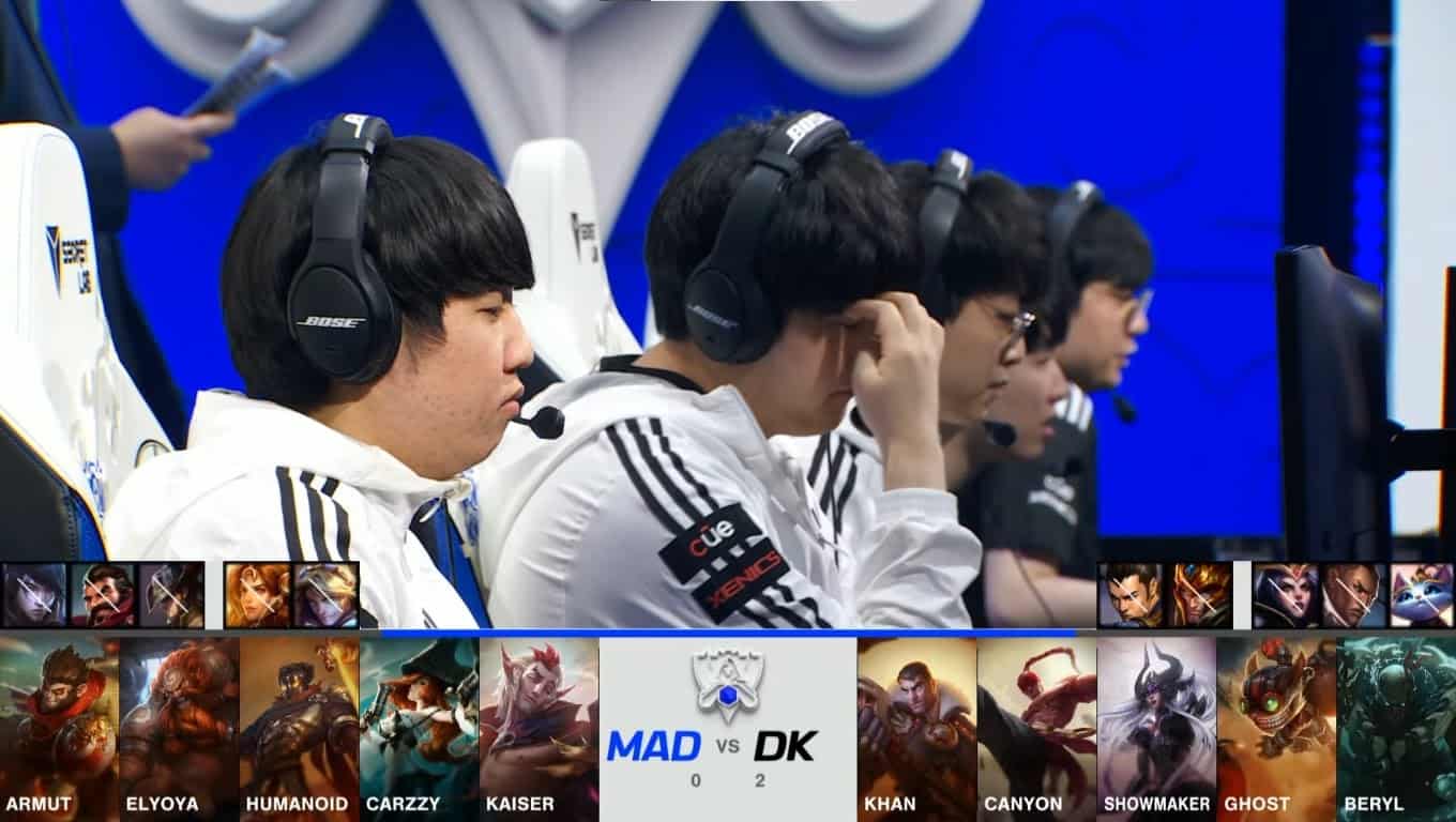 A screenshot from the 2021 World Championship Main Event Quarterfinals broadcast, showing the Game Three champion drafts between DAMWON KIA and MAD Lions with a shot of the DWG KIA lineup on stage above.