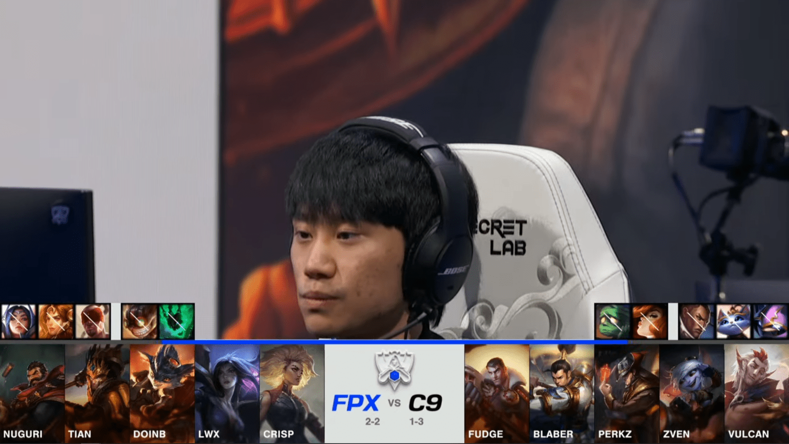 A screenshot from the 2021 World Championship Main Event Group Stage broadcast, showing the champion drafts between FunPlus Phoenix and Cloud9 with a shot of FPX mid laner Doinb above.