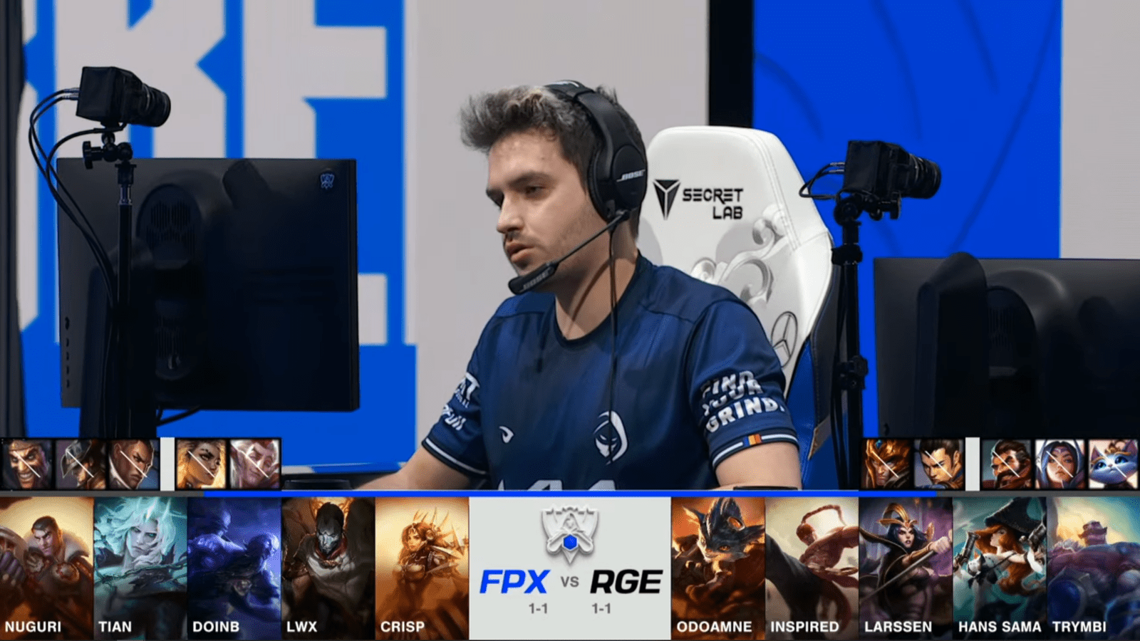 A screenshot from the 2021 World Championship Main Event Group Stage broadcast, showing the champion drafts between FunPlus Phoenix and Rogue with a shot of RGE top laner Odoamne above.