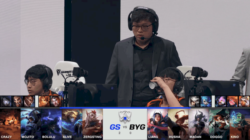 A screenshot from the 2021 World Championship Play-in Knockouts broadcast, showing the Game Three drafts between Beyond Gaming and Galatasaray Esports with a shot of the BYG coach and players on stage in the middle.