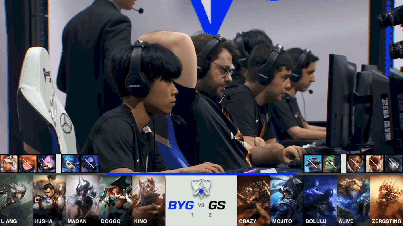 A screenshot from the 2021 World Championship Play-in Knockouts broadcast, showing the Game Four drafts between Beyond Gaming and Galatasaray Esports with a shot of the GS team on the Worlds 2021 stage in the middle.