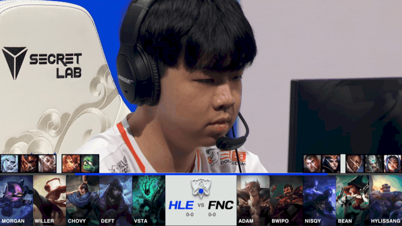 A screenshot from the 2021 World Championship Main Event Group Stage broadcast, showing the champion drafts between Hanwha Life Esports and Fnatic with a shot of HLE Vista above.