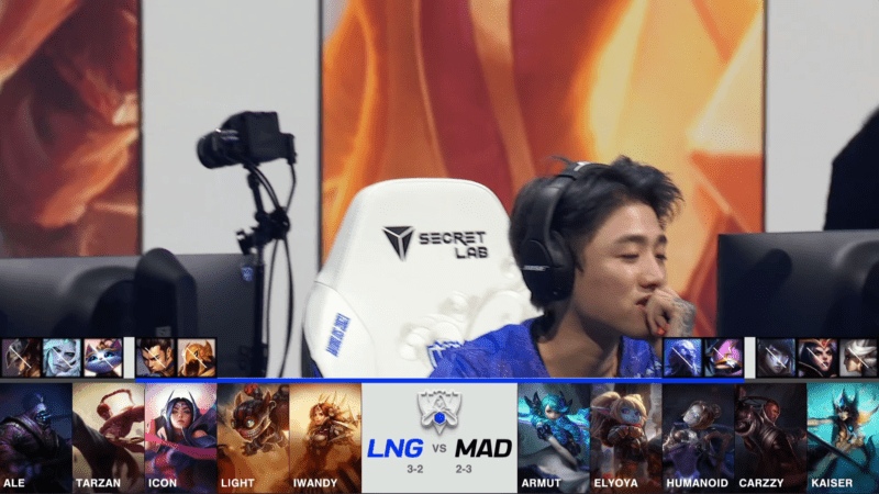 A screenshot from the 2021 World Championship Main Event Group Stage broadcast, showing the champion drafts between LNG Esports and MAD Lions with a shot of LNG mid laner Icon above.