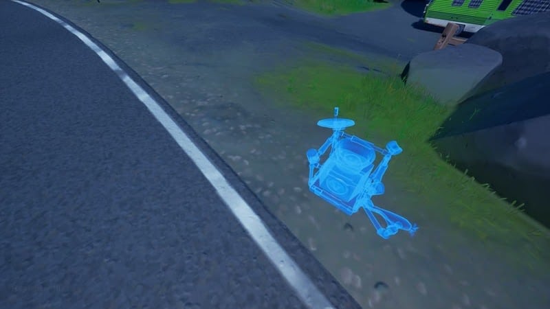 An in-game screenshot from Fortnite, showing a blue outline for where to use a seismograph.