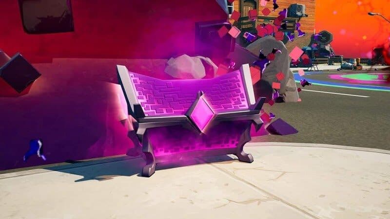 A Sideways Chest from Fortnite glows a purple aura on a city street.