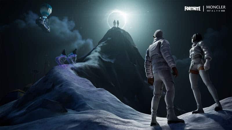 Two Fortnite character in Moncler apparel stand looking up towards something on a snowy mountain peak.