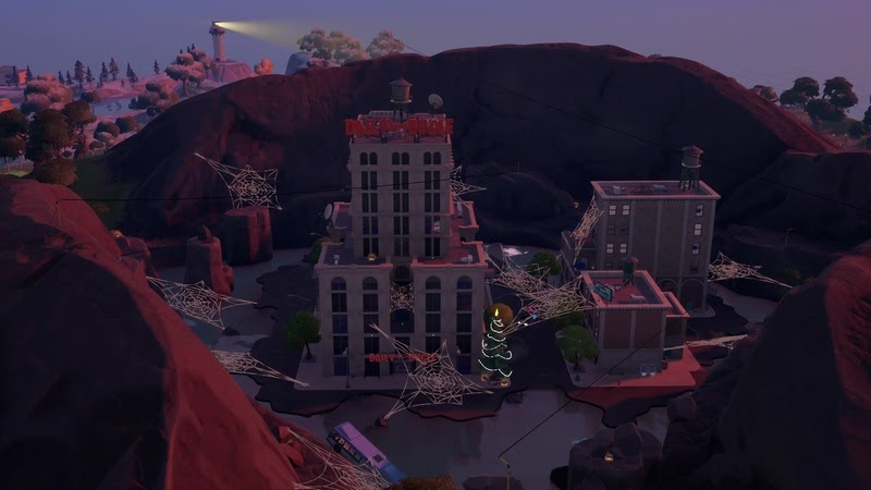 The iconic Daily Bugle building from Marvel's Spiderman as it appears during the game's night time phase