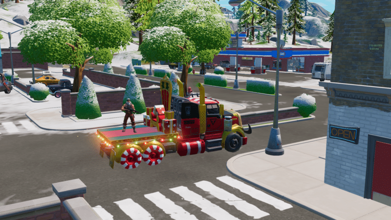 Sgt Winter's semi-truck drives through the streets on candy cane wheels