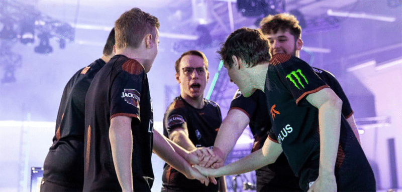 Fnatic's roster huddle together for a pep talk ahead of their match at Valorant Champions