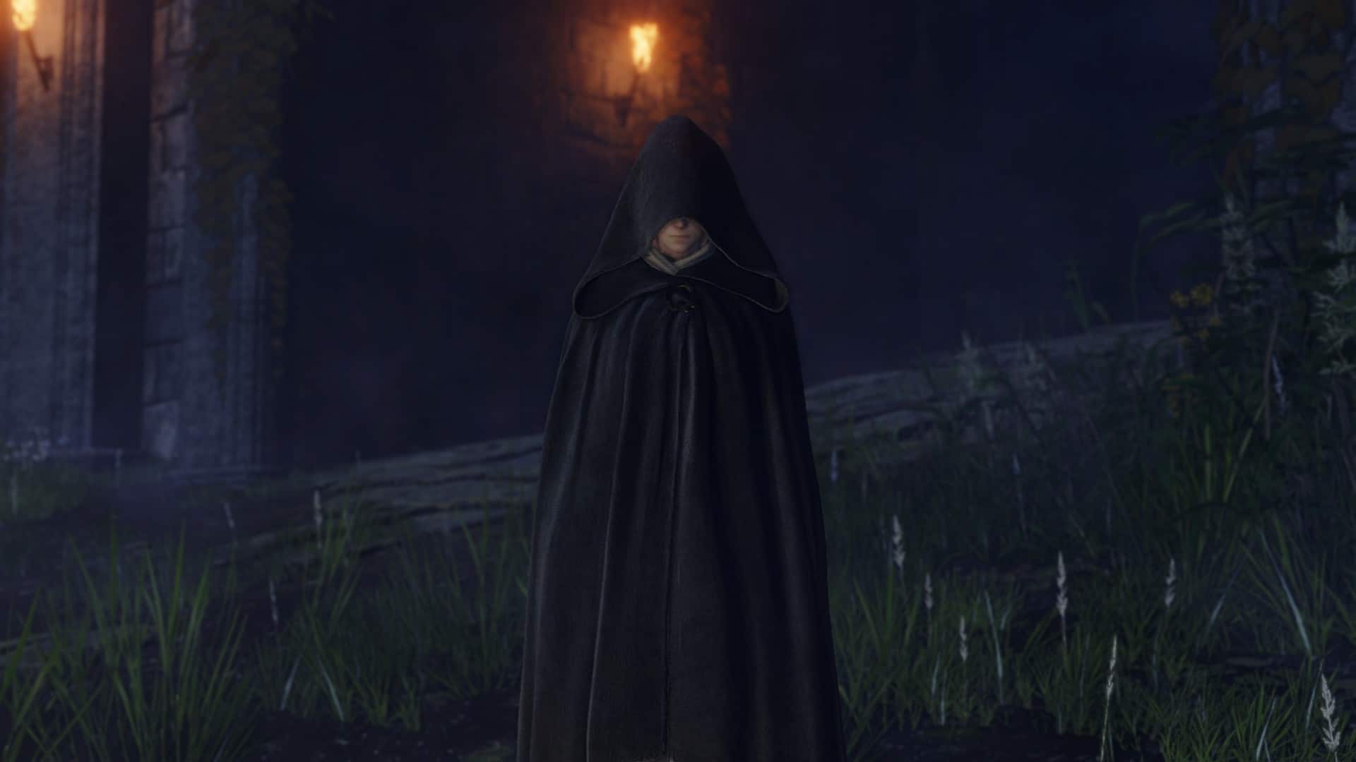 A woman appears in the swamp in a hooded black cloak, in FromSoftware's Elden Ring