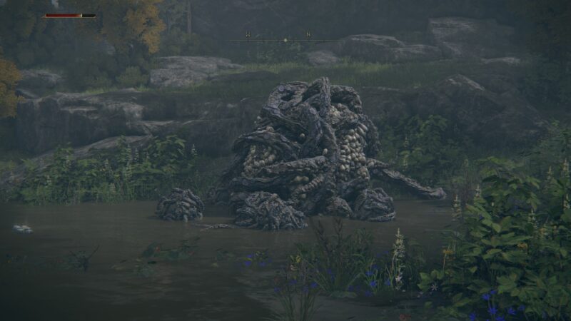 A writhing mass of wood and tentacles, one of the unique beasts in Elden Ring