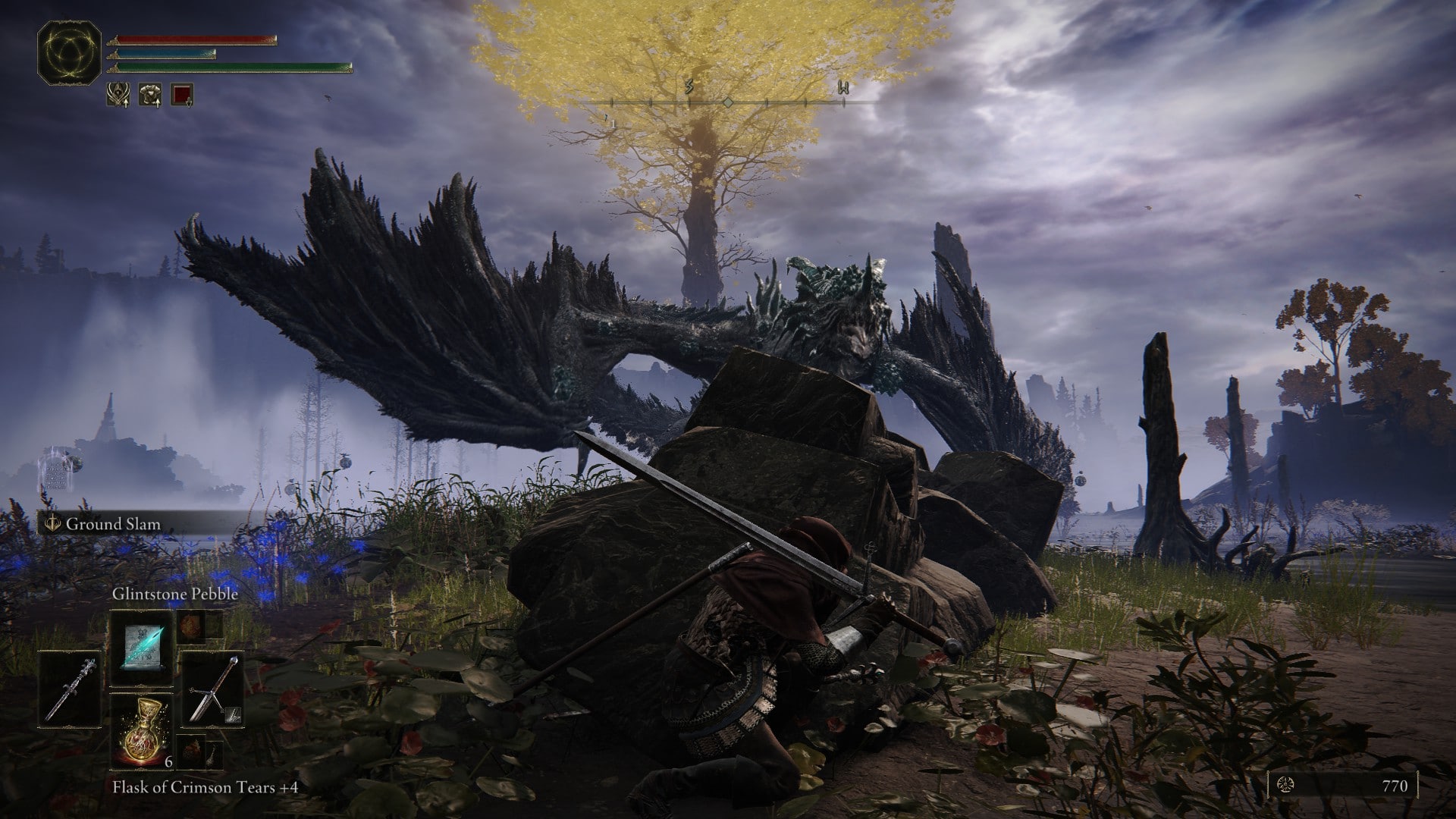 A large, glowing golden tree appears behind a character in a screen grab from Elden Ring