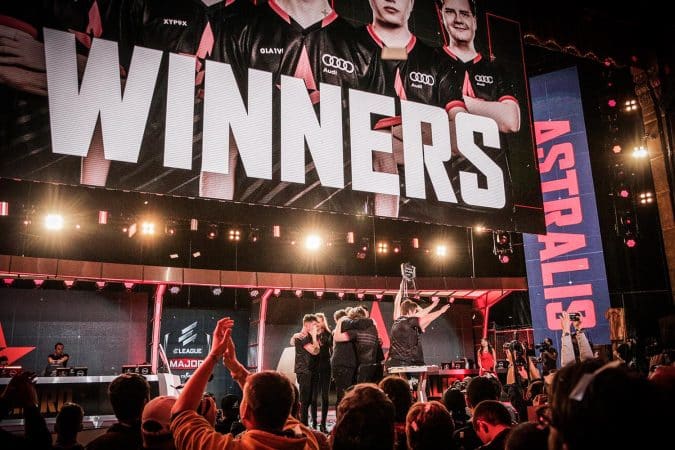 Astralis winning ELeague Major 2017 on stage with winners written on giant screen