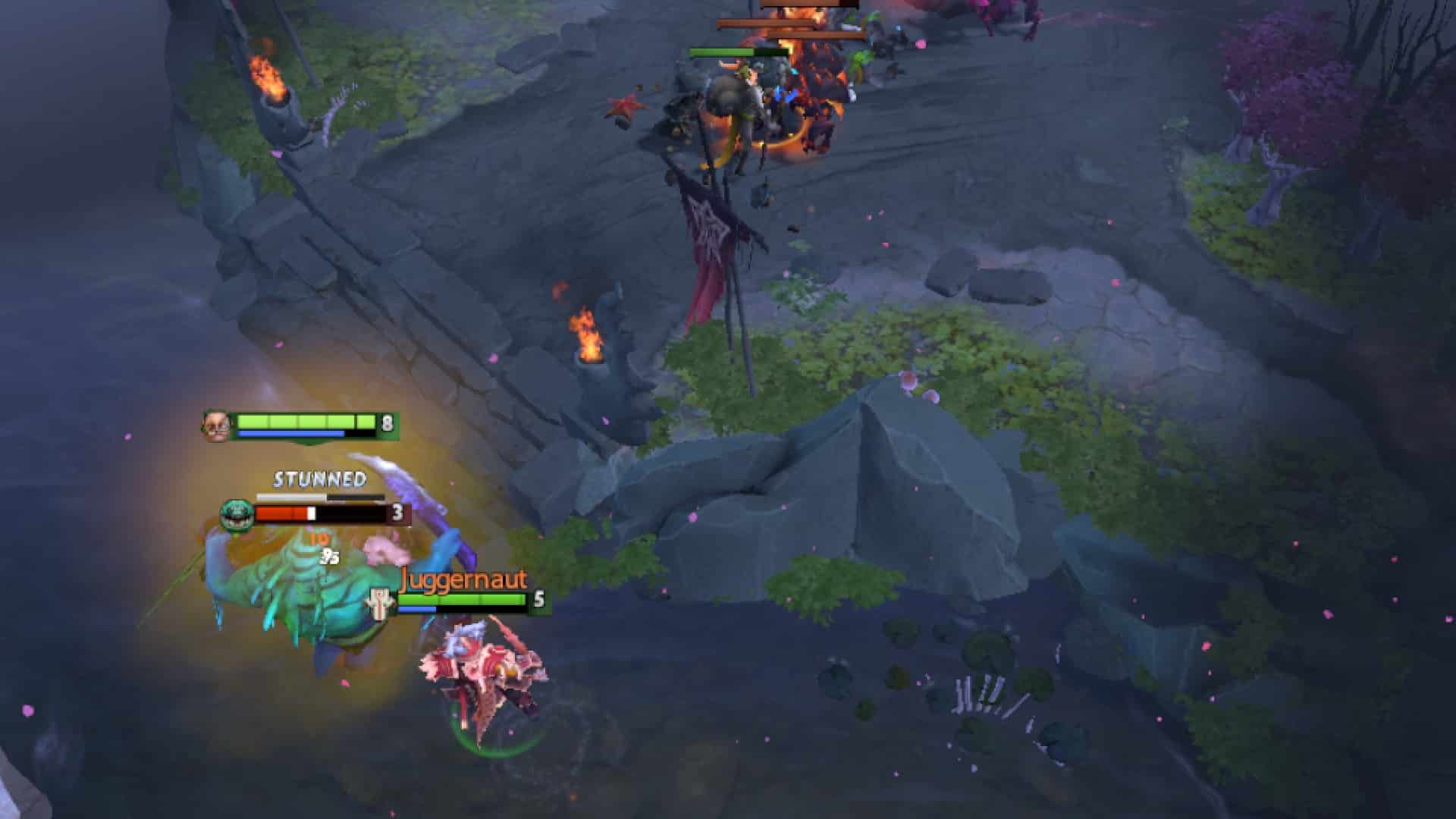 Pudge holds TIdehunter in place to let Juggernaut attack him