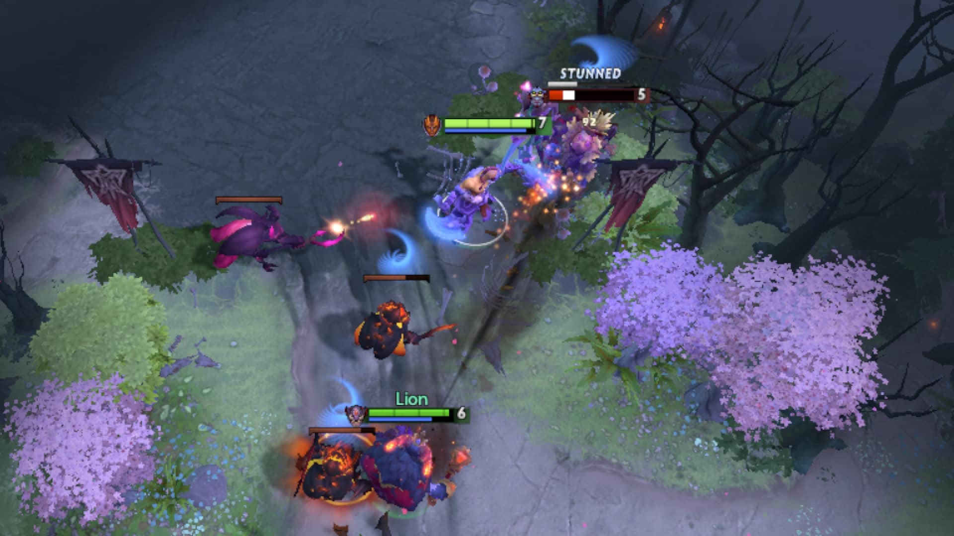 Lion stuns an enemy hero using Earth Spike to help Anti-Mage