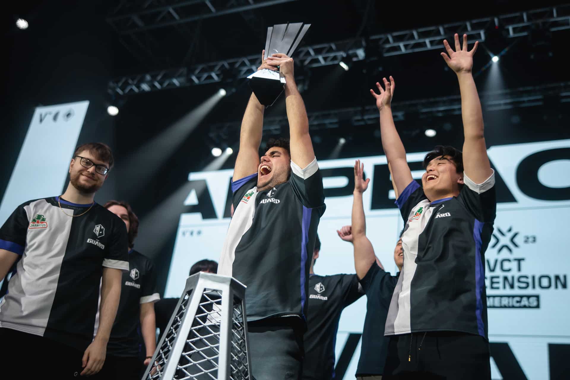 The Guard holding the Ascension Americas trophy 